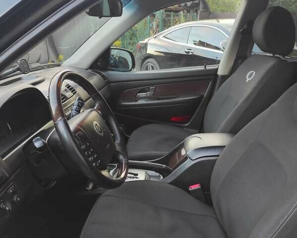 Черный Cанг Йонг Рекстон, объемом двигателя 2 л и пробегом 158 тыс. км за 13800 $, фото 2 на Automoto.ua