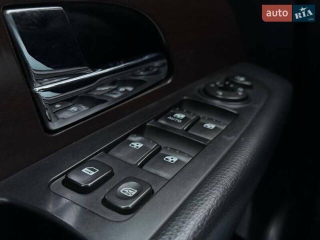 Чорний Cанг Йонг Rexton, об'ємом двигуна 2 л та пробігом 155 тис. км за 13890 $, фото 15 на Automoto.ua