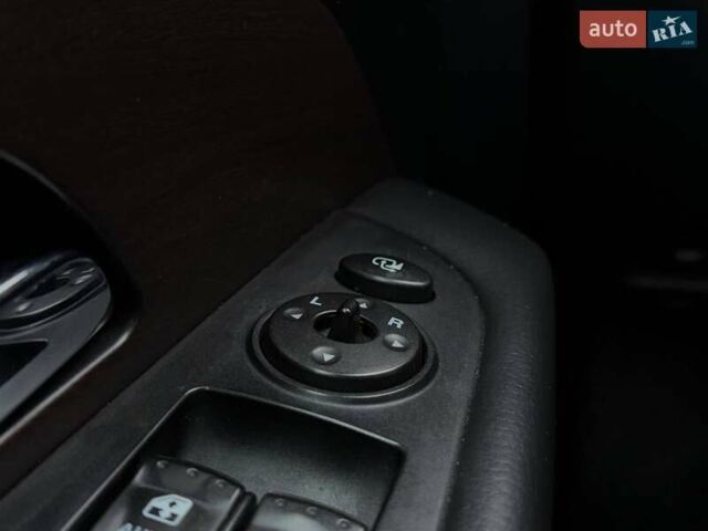 Чорний Cанг Йонг Rexton, об'ємом двигуна 2 л та пробігом 155 тис. км за 13890 $, фото 16 на Automoto.ua