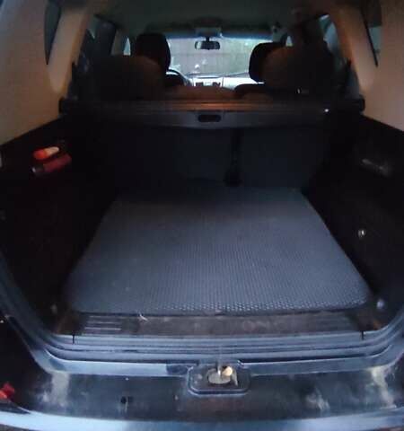 Черный Cанг Йонг Рекстон, объемом двигателя 2 л и пробегом 158 тыс. км за 13800 $, фото 11 на Automoto.ua