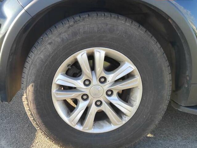 Черный Cанг Йонг Рекстон, объемом двигателя 2 л и пробегом 158 тыс. км за 13800 $, фото 1 на Automoto.ua