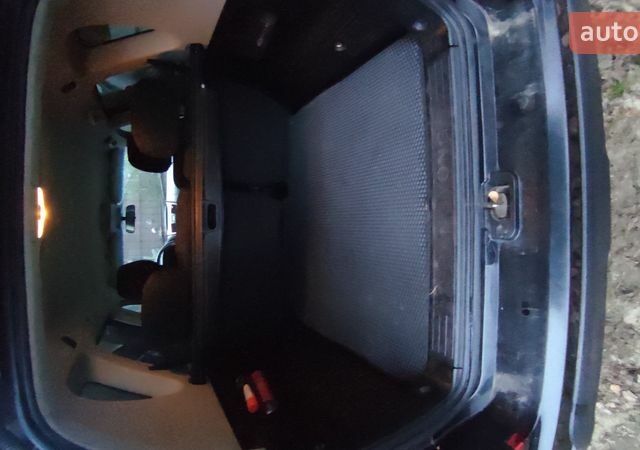 Черный Cанг Йонг Рекстон, объемом двигателя 2 л и пробегом 156 тыс. км за 11900 $, фото 19 на Automoto.ua