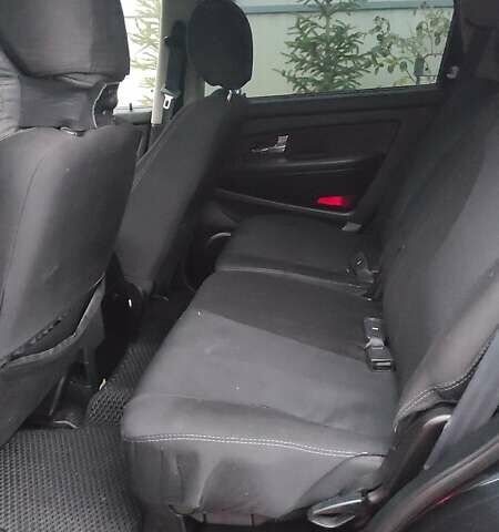 Черный Cанг Йонг Рекстон, объемом двигателя 2 л и пробегом 158 тыс. км за 13800 $, фото 10 на Automoto.ua