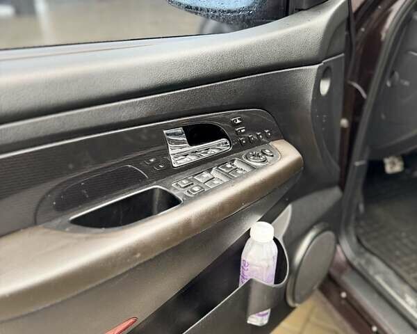 Фиолетовый Cанг Йонг Рекстон, объемом двигателя 2.7 л и пробегом 264 тыс. км за 8500 $, фото 12 на Automoto.ua