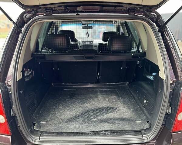 Фиолетовый Cанг Йонг Рекстон, объемом двигателя 2.7 л и пробегом 264 тыс. км за 8500 $, фото 15 на Automoto.ua