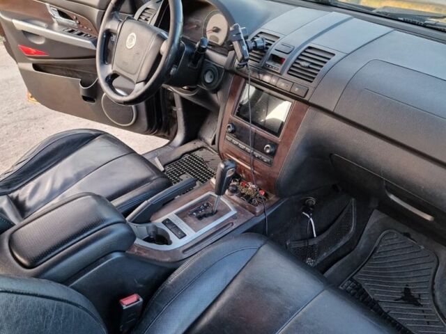 Коричневый Cанг Йонг Рекстон, объемом двигателя 2.7 л и пробегом 3 тыс. км за 7000 $, фото 5 на Automoto.ua