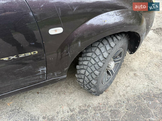 Коричневий Cанг Йонг Rexton, об'ємом двигуна 2.3 л та пробігом 203 тис. км за 4500 $, фото 5 на Automoto.ua