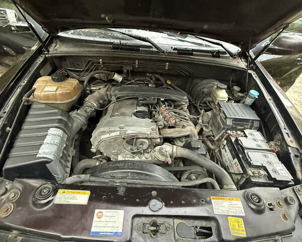 Коричневий Cанг Йонг Rexton, об'ємом двигуна 2.3 л та пробігом 203 тис. км за 4500 $, фото 12 на Automoto.ua