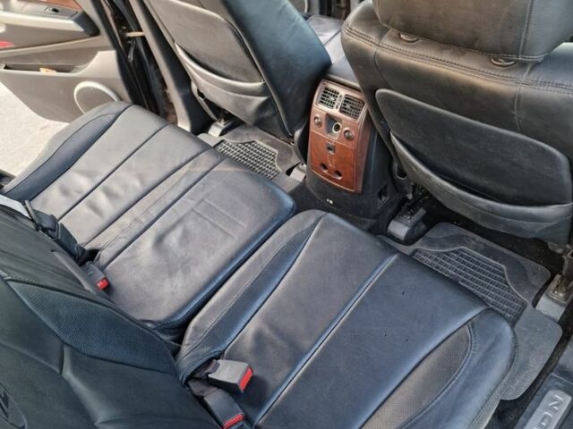 Коричневый Cанг Йонг Рекстон, объемом двигателя 2.7 л и пробегом 3 тыс. км за 7000 $, фото 6 на Automoto.ua