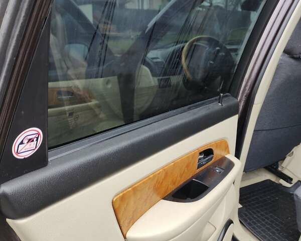 Коричневий Cанг Йонг Rexton, об'ємом двигуна 2.7 л та пробігом 263 тис. км за 7900 $, фото 19 на Automoto.ua