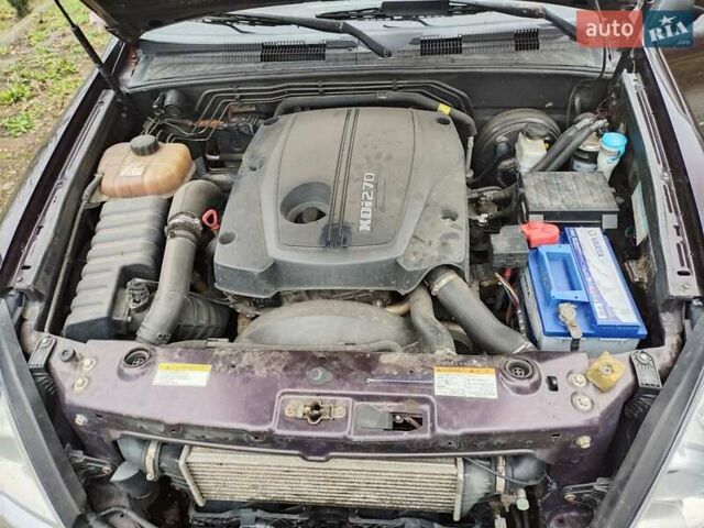 Коричневий Cанг Йонг Rexton, об'ємом двигуна 2.7 л та пробігом 263 тис. км за 7900 $, фото 10 на Automoto.ua