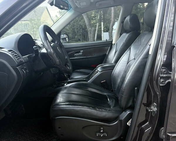 Коричневий Cанг Йонг Rexton, об'ємом двигуна 2.7 л та пробігом 228 тис. км за 6699 $, фото 11 на Automoto.ua