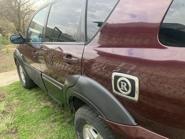 Коричневий Cанг Йонг Rexton, об'ємом двигуна 2.7 л та пробігом 155 тис. км за 6000 $, фото 7 на Automoto.ua