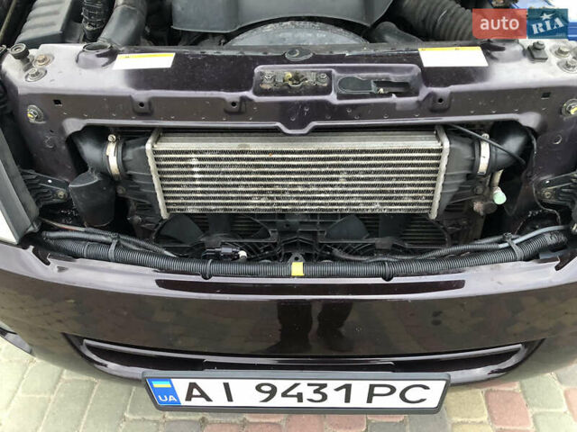 Коричневий Cанг Йонг Rexton, об'ємом двигуна 2.7 л та пробігом 367 тис. км за 8150 $, фото 10 на Automoto.ua