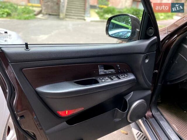 Коричневий Cанг Йонг Rexton, об'ємом двигуна 2.7 л та пробігом 166 тис. км за 12500 $, фото 14 на Automoto.ua