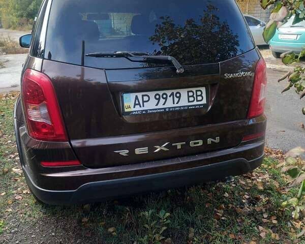 Коричневый Cанг Йонг Рекстон, объемом двигателя 2.7 л и пробегом 53 тыс. км за 15000 $, фото 2 на Automoto.ua