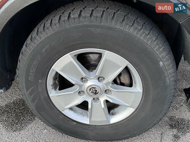 Коричневый Cанг Йонг Рекстон, объемом двигателя 2.7 л и пробегом 242 тыс. км за 12500 $, фото 4 на Automoto.ua