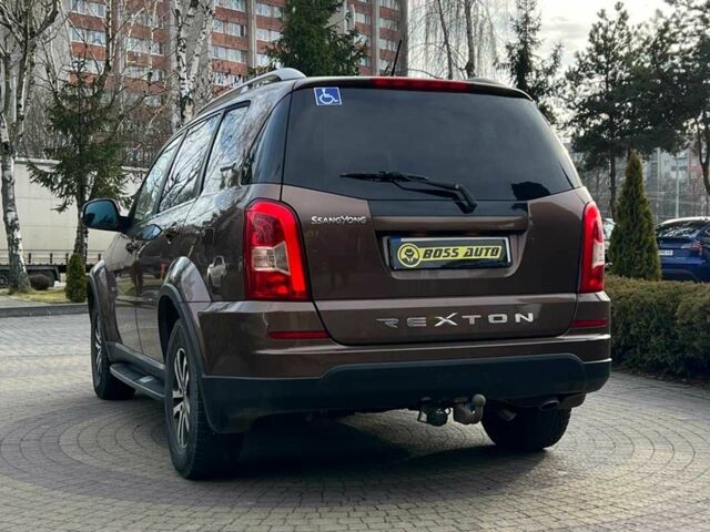 Коричневий Cанг Йонг Rexton, об'ємом двигуна 2 л та пробігом 87 тис. км за 14650 $, фото 4 на Automoto.ua