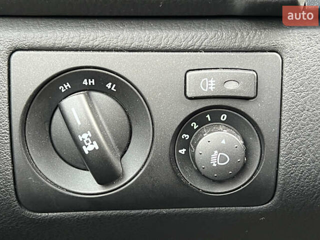 Коричневый Cанг Йонг Рекстон, объемом двигателя 2 л и пробегом 87 тыс. км за 14650 $, фото 18 на Automoto.ua