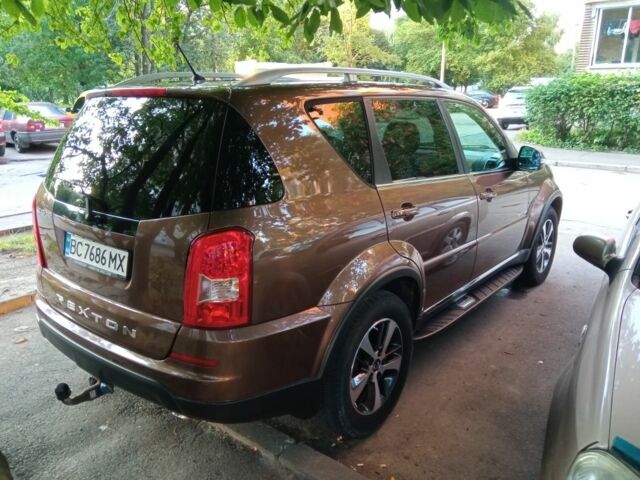 Коричневый Cанг Йонг Рекстон, объемом двигателя 2 л и пробегом 87 тыс. км за 14300 $, фото 2 на Automoto.ua