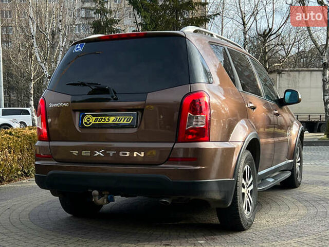 Коричневый Cанг Йонг Рекстон, объемом двигателя 2 л и пробегом 87 тыс. км за 14650 $, фото 6 на Automoto.ua