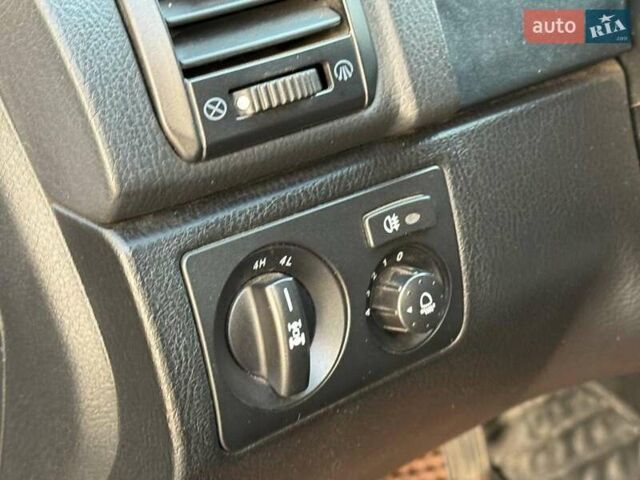 Червоний Cанг Йонг Rexton, об'ємом двигуна 2.7 л та пробігом 207 тис. км за 8690 $, фото 11 на Automoto.ua