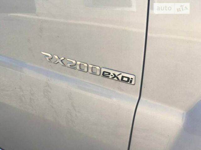 Сірий Cанг Йонг Rexton, об'ємом двигуна 2 л та пробігом 99 тис. км за 12000 $, фото 9 на Automoto.ua