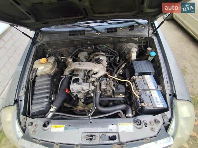 Сірий Cанг Йонг Rexton, об'ємом двигуна 2.87 л та пробігом 357 тис. км за 7000 $, фото 9 на Automoto.ua