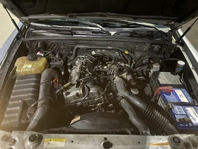 Сірий Cанг Йонг Rexton, об'ємом двигуна 2.7 л та пробігом 288 тис. км за 4299 $, фото 20 на Automoto.ua