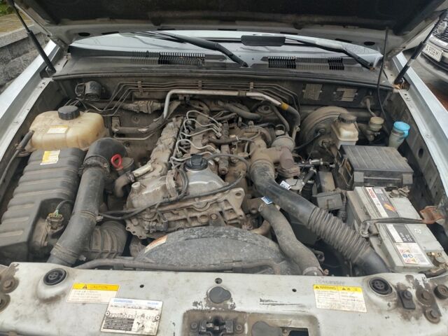 Сірий Cанг Йонг Rexton, об'ємом двигуна 2.7 л та пробігом 237 тис. км за 4400 $, фото 7 на Automoto.ua