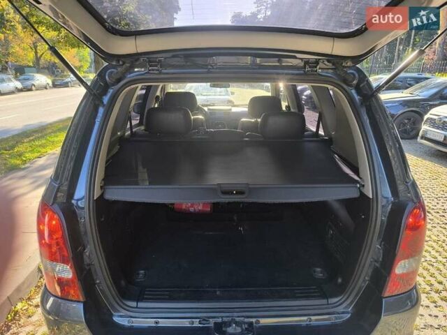 Сірий Cанг Йонг Rexton, об'ємом двигуна 2.7 л та пробігом 151 тис. км за 4999 $, фото 5 на Automoto.ua