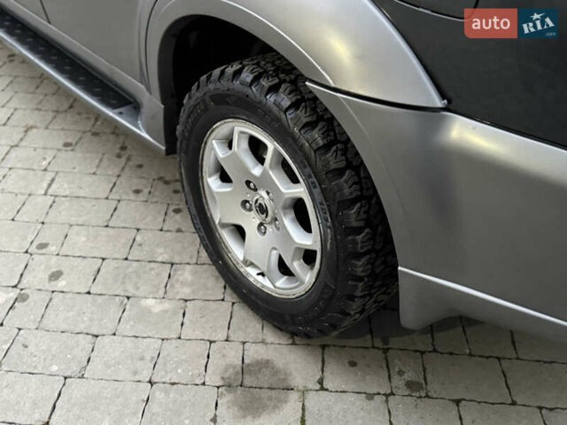 Серый Cанг Йонг Рекстон, объемом двигателя 2.7 л и пробегом 275 тыс. км за 6999 $, фото 9 на Automoto.ua