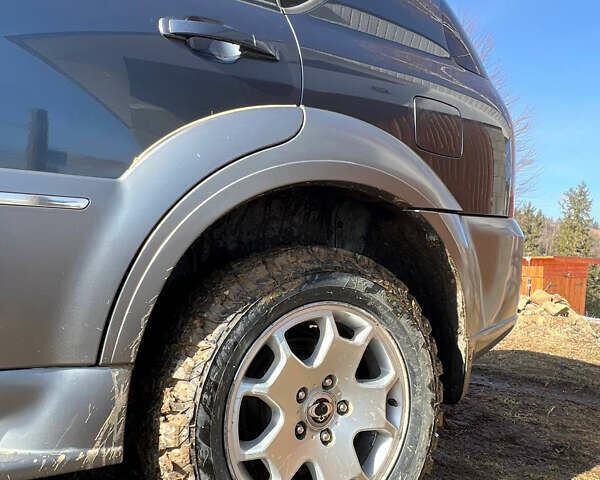 Сірий Cанг Йонг Rexton, об'ємом двигуна 2.7 л та пробігом 270 тис. км за 6994 $, фото 18 на Automoto.ua