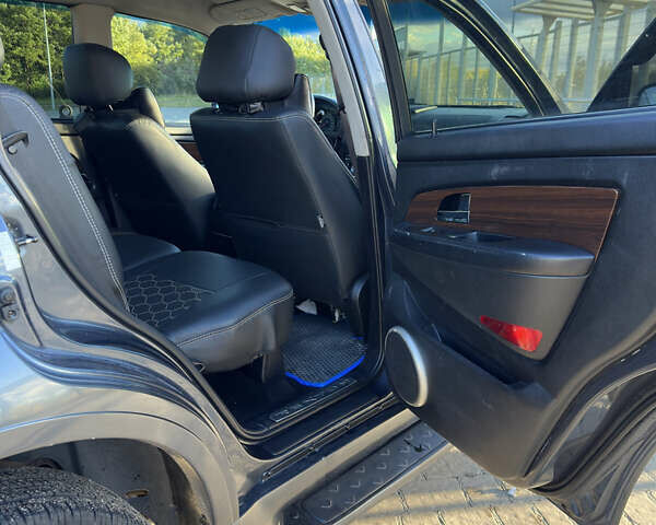 Сірий Cанг Йонг Rexton, об'ємом двигуна 2.7 л та пробігом 208 тис. км за 6800 $, фото 12 на Automoto.ua