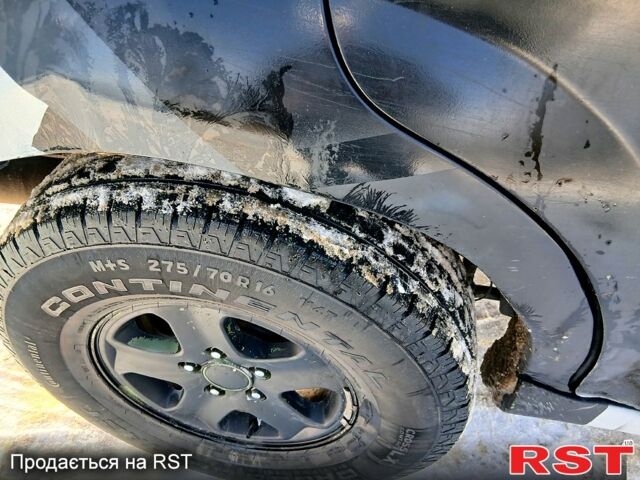 Серый Cанг Йонг Рекстон, объемом двигателя 2.7 л и пробегом 32000 тыс. км за 3300 $, фото 12 на Automoto.ua