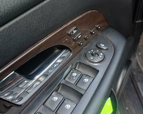 Серый Cанг Йонг Рекстон, объемом двигателя 2.7 л и пробегом 412 тыс. км за 5700 $, фото 6 на Automoto.ua