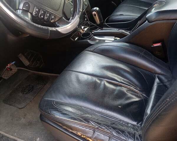 Серый Cанг Йонг Рекстон, объемом двигателя 2.7 л и пробегом 412 тыс. км за 5700 $, фото 5 на Automoto.ua