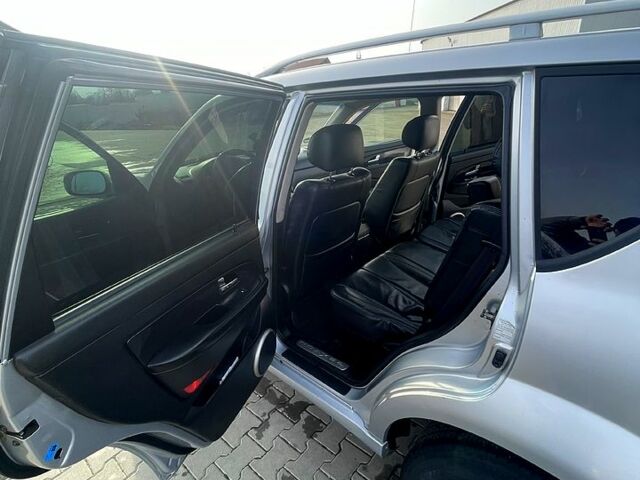 Сірий Cанг Йонг Rexton, об'ємом двигуна 2.7 л та пробігом 301 тис. км за 3150 $, фото 12 на Automoto.ua