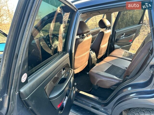 Сірий Cанг Йонг Rexton, об'ємом двигуна 2.7 л та пробігом 233 тис. км за 9000 $, фото 13 на Automoto.ua