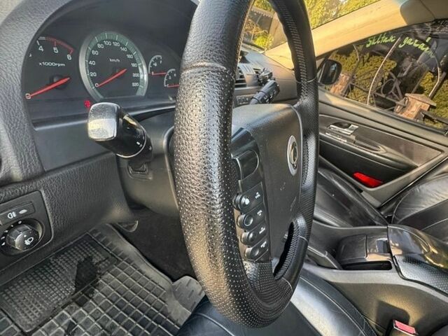 Сірий Cанг Йонг Rexton, об'ємом двигуна 2.7 л та пробігом 246 тис. км за 8500 $, фото 26 на Automoto.ua