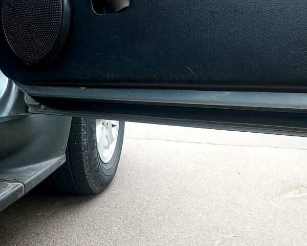 Сірий Cанг Йонг Rexton, об'ємом двигуна 2.7 л та пробігом 168 тис. км за 9350 $, фото 7 на Automoto.ua