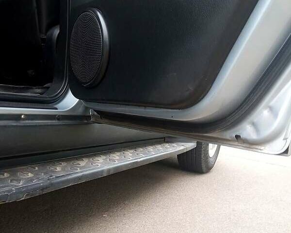 Сірий Cанг Йонг Rexton, об'ємом двигуна 2.7 л та пробігом 168 тис. км за 9350 $, фото 6 на Automoto.ua