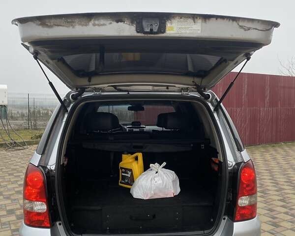 Сірий Cанг Йонг Rexton, об'ємом двигуна 2.7 л та пробігом 232 тис. км за 8300 $, фото 3 на Automoto.ua