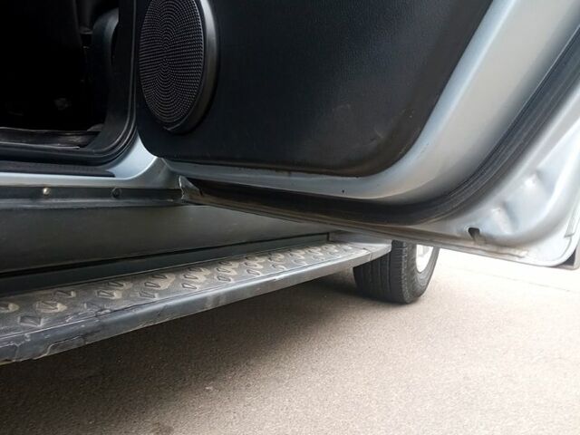 Сірий Cанг Йонг Rexton, об'ємом двигуна 2.7 л та пробігом 168 тис. км за 9350 $, фото 7 на Automoto.ua