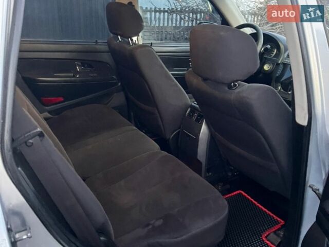 Серый Cанг Йонг Рекстон, объемом двигателя 2.7 л и пробегом 312 тыс. км за 11500 $, фото 7 на Automoto.ua