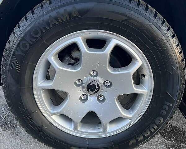 Серый Cанг Йонг Рекстон, объемом двигателя 2.7 л и пробегом 120 тыс. км за 11500 $, фото 27 на Automoto.ua