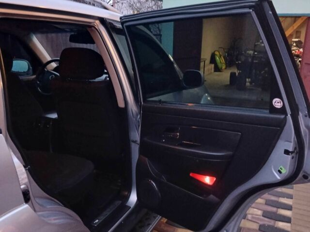 Серый Cанг Йонг Рекстон, объемом двигателя 2.7 л и пробегом 180 тыс. км за 10500 $, фото 12 на Automoto.ua