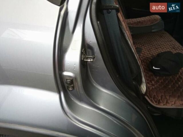 Сірий Cанг Йонг Rexton, об'ємом двигуна 2.7 л та пробігом 156 тис. км за 11500 $, фото 5 на Automoto.ua