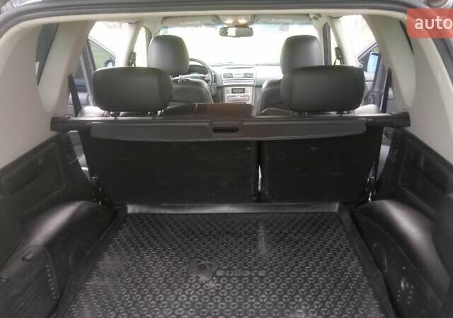 Серый Cанг Йонг Рекстон, объемом двигателя 2.7 л и пробегом 250 тыс. км за 13500 $, фото 4 на Automoto.ua