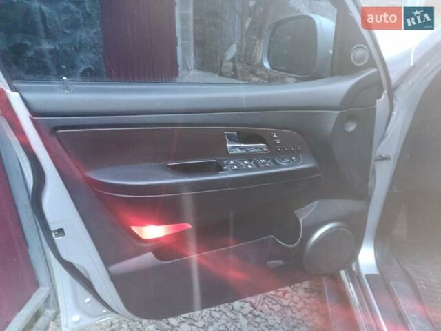 Сірий Cанг Йонг Rexton, об'ємом двигуна 2 л та пробігом 189 тис. км за 15000 $, фото 5 на Automoto.ua